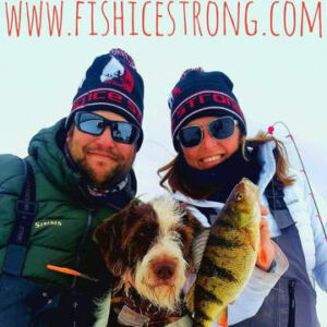 Laura and Capt. Matt Strong with perch and pup